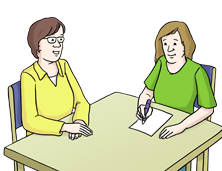 Eine Person unterstützt eine andere Person beim Schreiben Eine Person unterstützt eine andere Person beim Schreiben